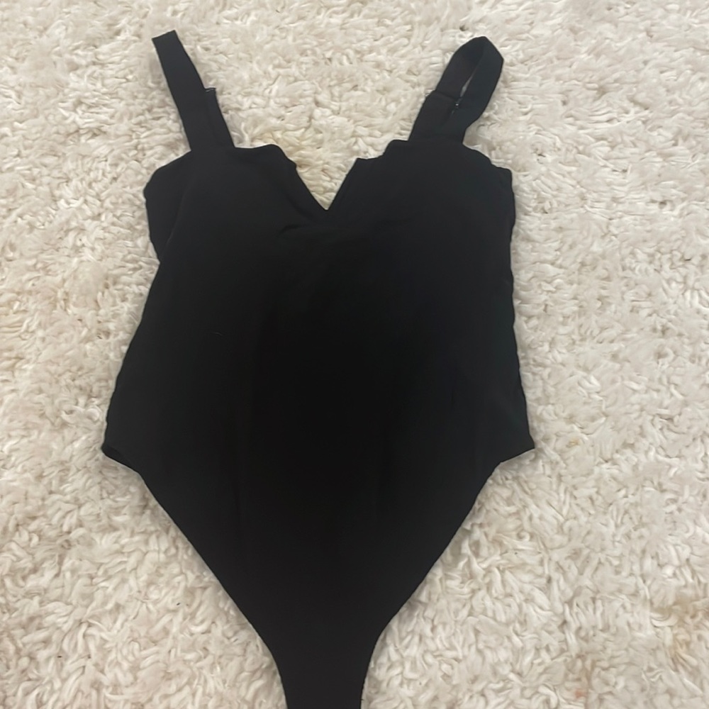 Black free people body suit!